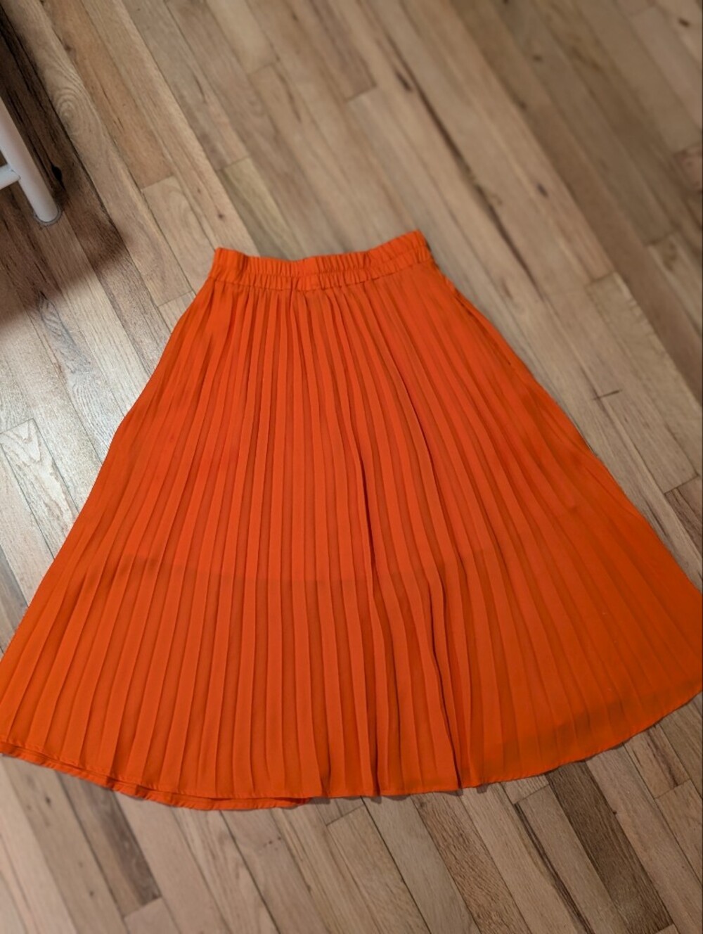 Pleated Orange Midi Skirt